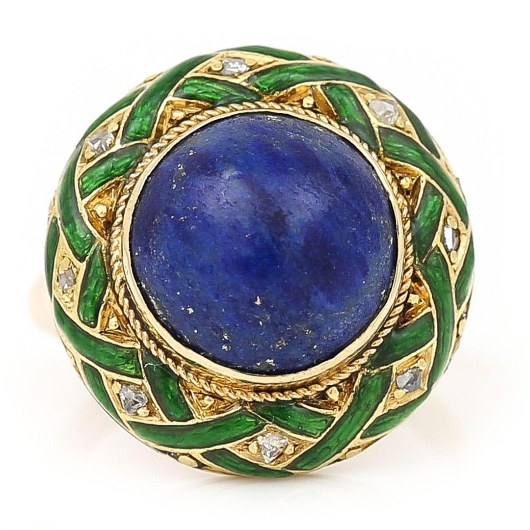 A super unusual Edwardian lapis lazuli, rose cut diamond and green enamel dome ring dating from circa 1910. The central set large, polish cabochon lapis is a deep blue colour with the typical golden flecks focused around the edge. Detailed with an