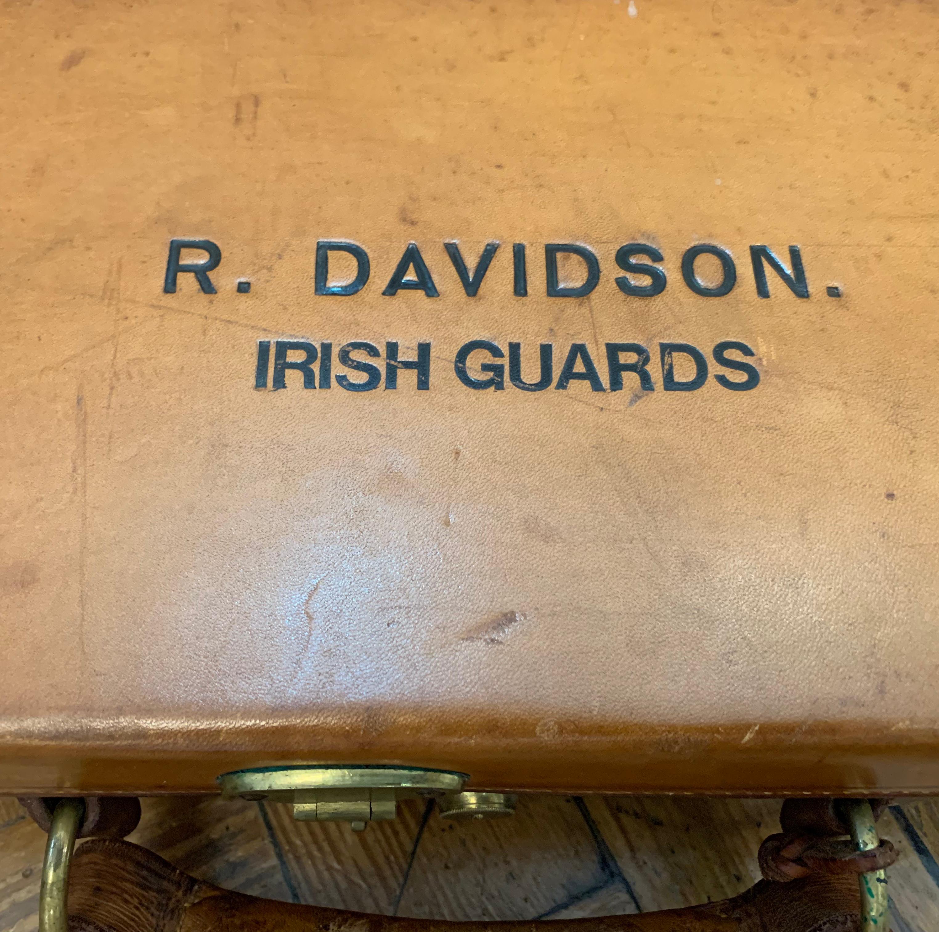 A stunning late Victorian, early Edwardian Leather over oak gun case. Possibly for a hunting rifle or a Snipers Rifle.

The case is in incredible, almost unused condition. The lid bears the embossed name details of R. Davidson, Irish Guards. We