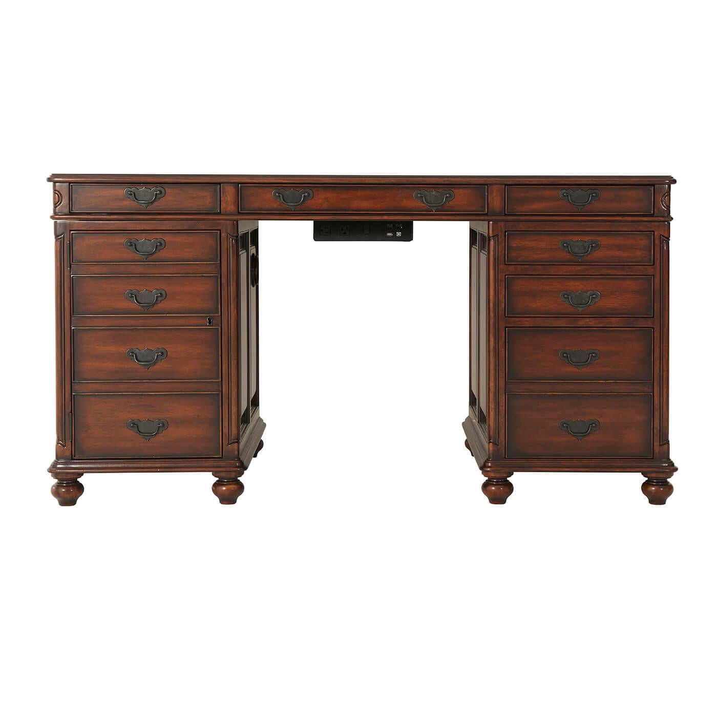 An English Edwardian style hand carved pedestal desk, with a leather inset top, three frieze drawers, one pedestal with cupboard the other with two drawers and a filing drawer. 

Dimensions: 58