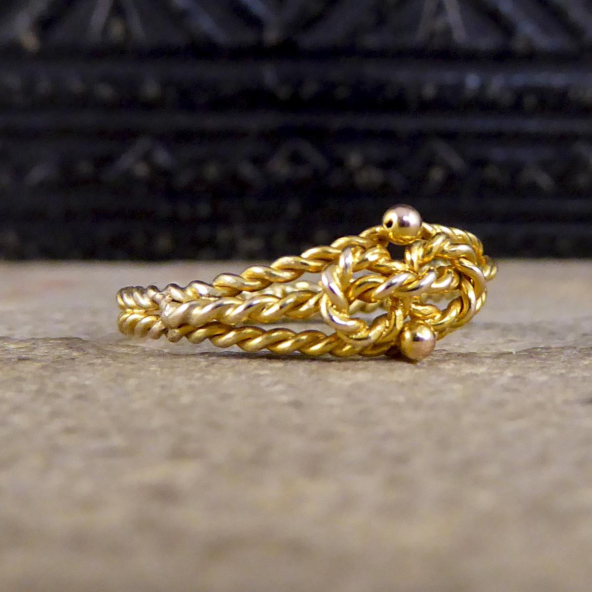 This gorgeous little love knot ring was crafted from 9ct Yellow Gold in a rope design. It was hand crafted in the Edwardian era, a time when knot rings were very popular as they sent a message to the receiver that the two people were tied together