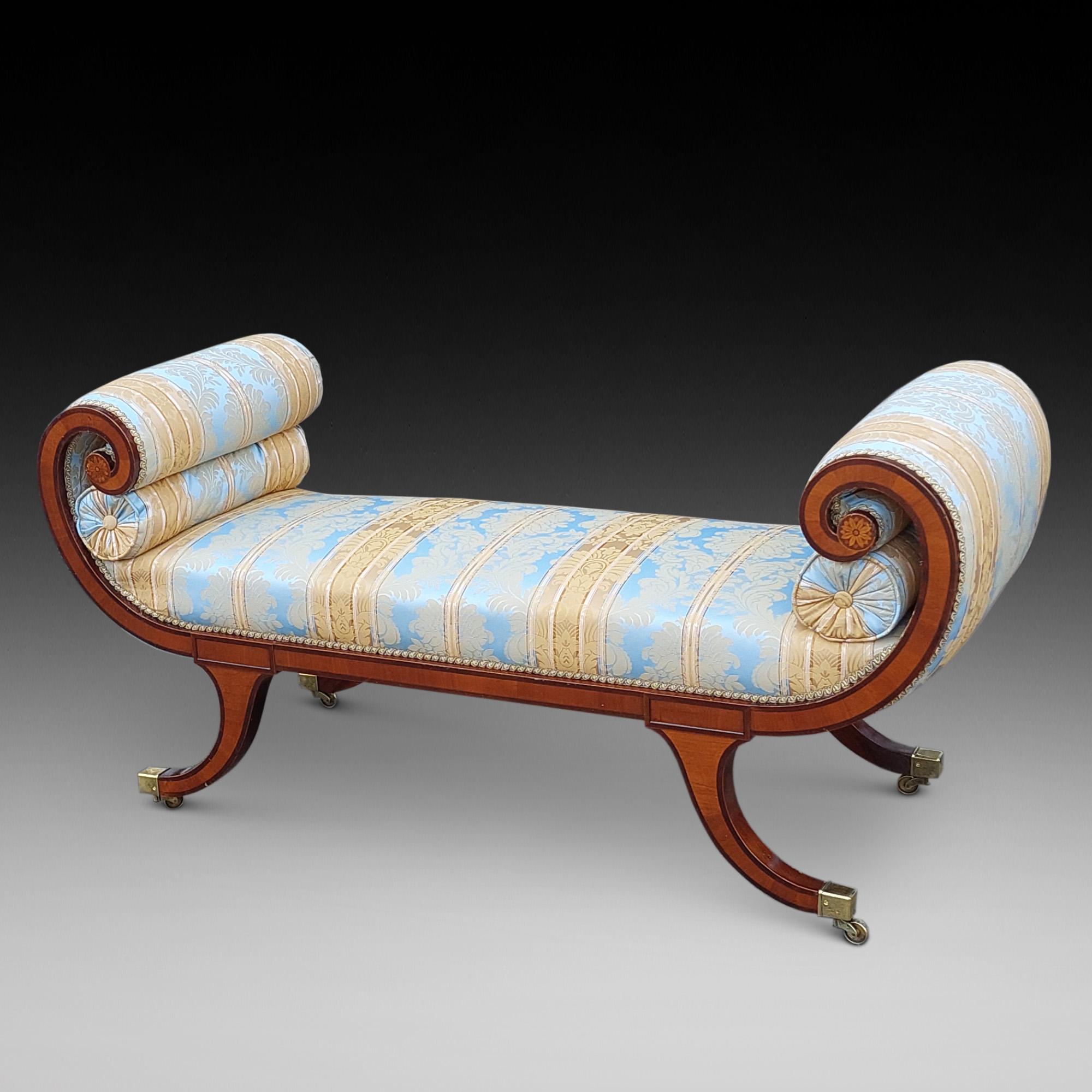 Edwardian Mahogany and Inlaid Window Seat in the Regency style with scroll arms over an upholstered seat on square tapered splayed supports to brass caps and castors - 56