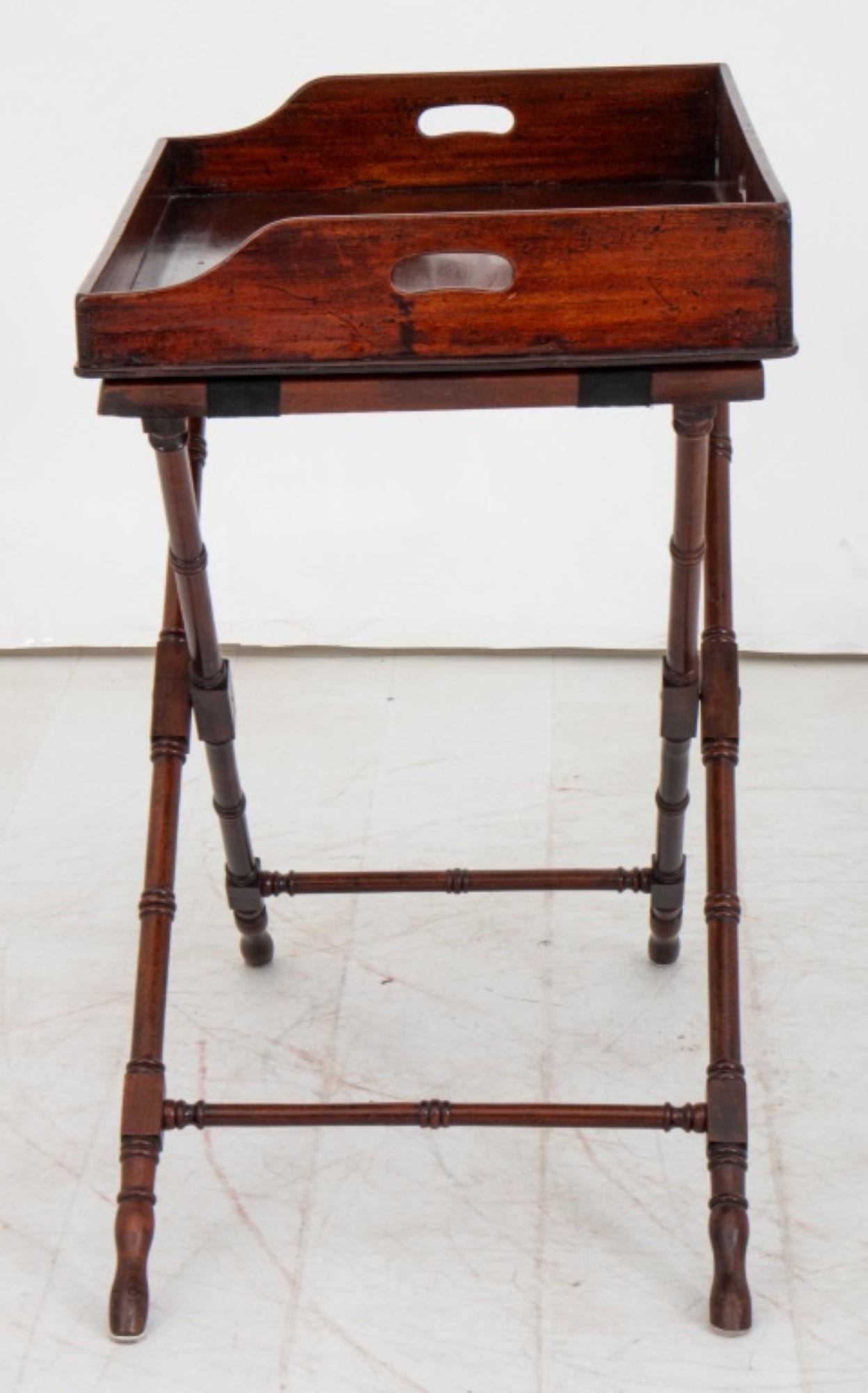 Edwardian Mahogany Butler's Tray on Turned Wood Stand, circa 1910. Provenance: From the 50 East 89th Street estate of a 20th-century.

Dealer: S138XX
