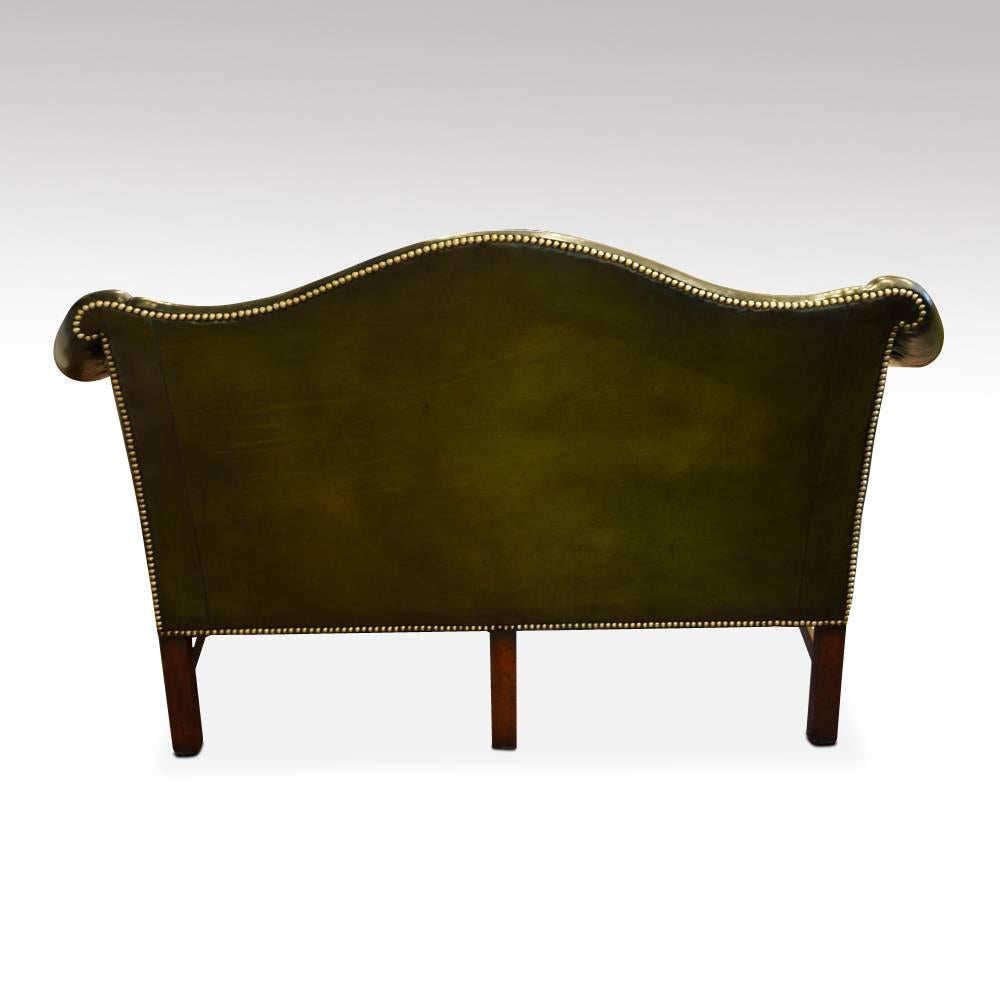 Edwardian camel back Chippendale style sofa
This Edwardian camel back Chippendale style sofa would have been made circa 1910.
In the Chippendale design with blind fret decoration around the mahogany frame.
The sofa stands on moulded legs, that