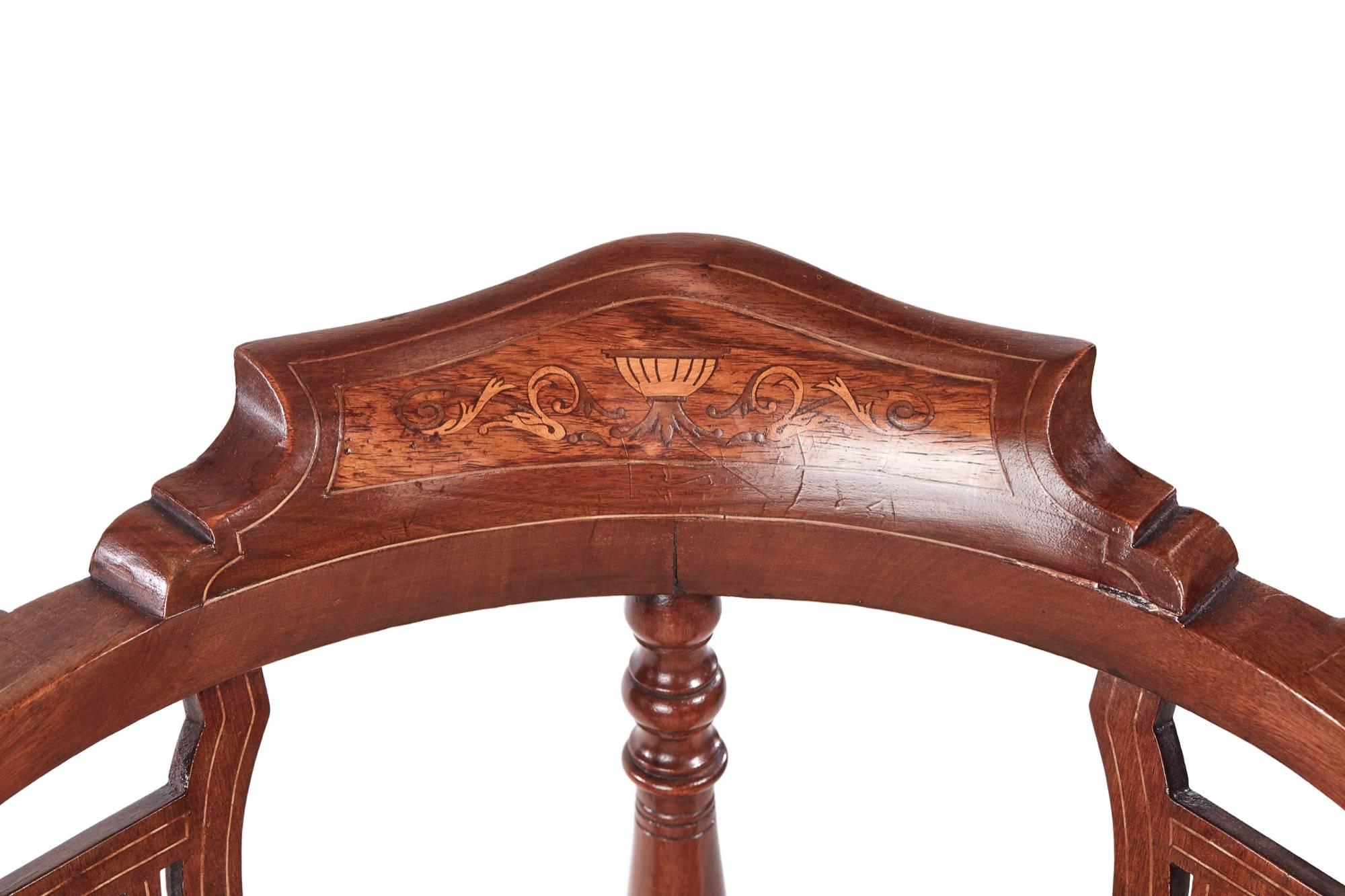 Edwardian mahogany inlaid corner chair, having a nice shaped back inlaid with satinwood, inlaid pierced shaped splats, inlaid serpentine front rail, raised on lovely turned legs united by a turned cross stretcher, newly recovered seat.