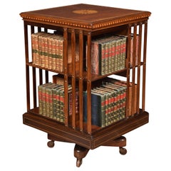 Bibliothèque tournante Edouardienne en acajou marqueté par Maple & Co