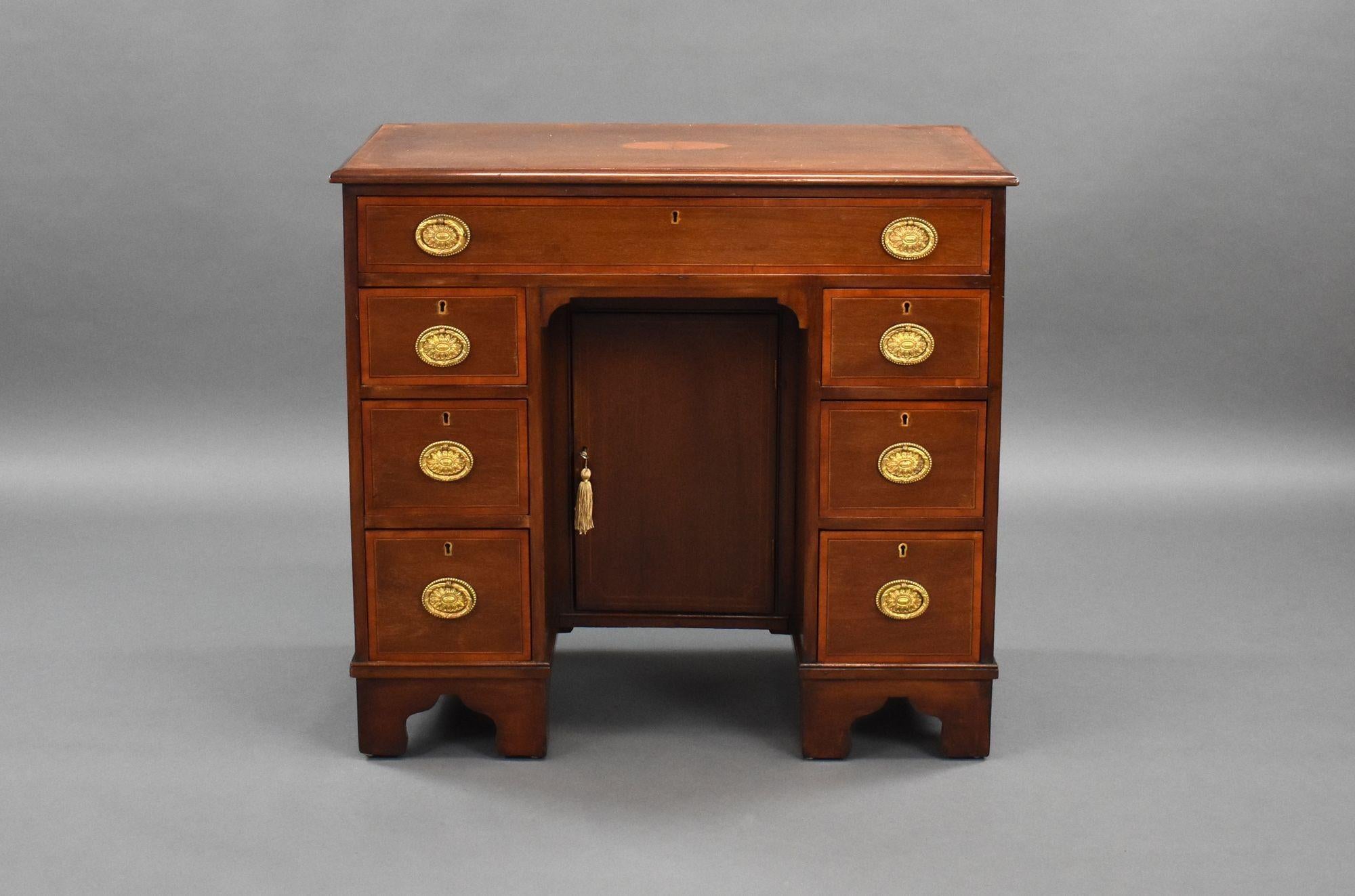 For sale is a good quality Edwardian mahogany knee hole desk, having an arrangement of seven drawers and a cupboard to the centre. The desk stands on bracket feet and is in very good condition.

Width: 84cm Depth: 44cm Height: 78cm