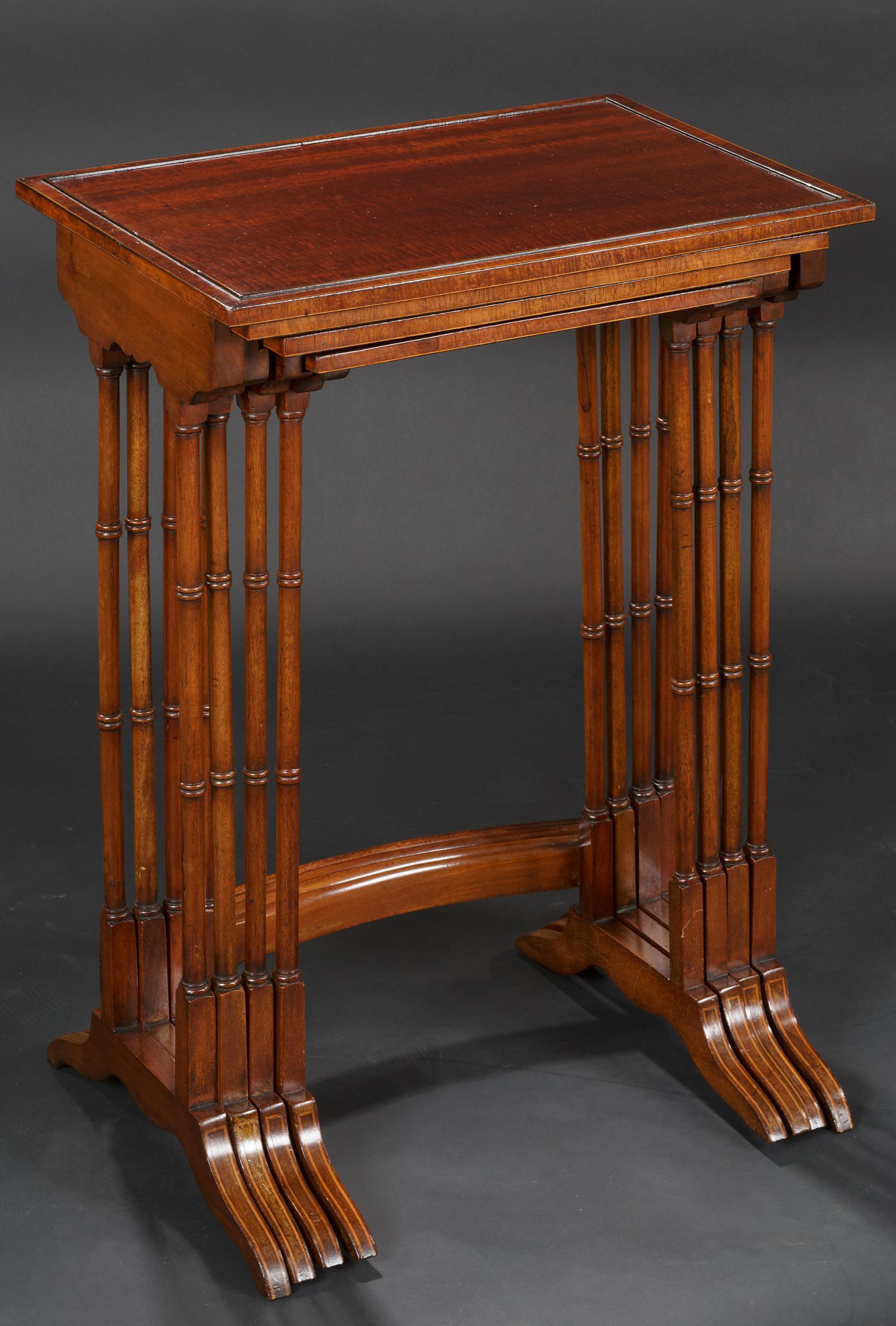 Edwardian nest of 4 tables

Edwardian inlaid mahogany nest of four tables with bow front stretcher, c.1900.