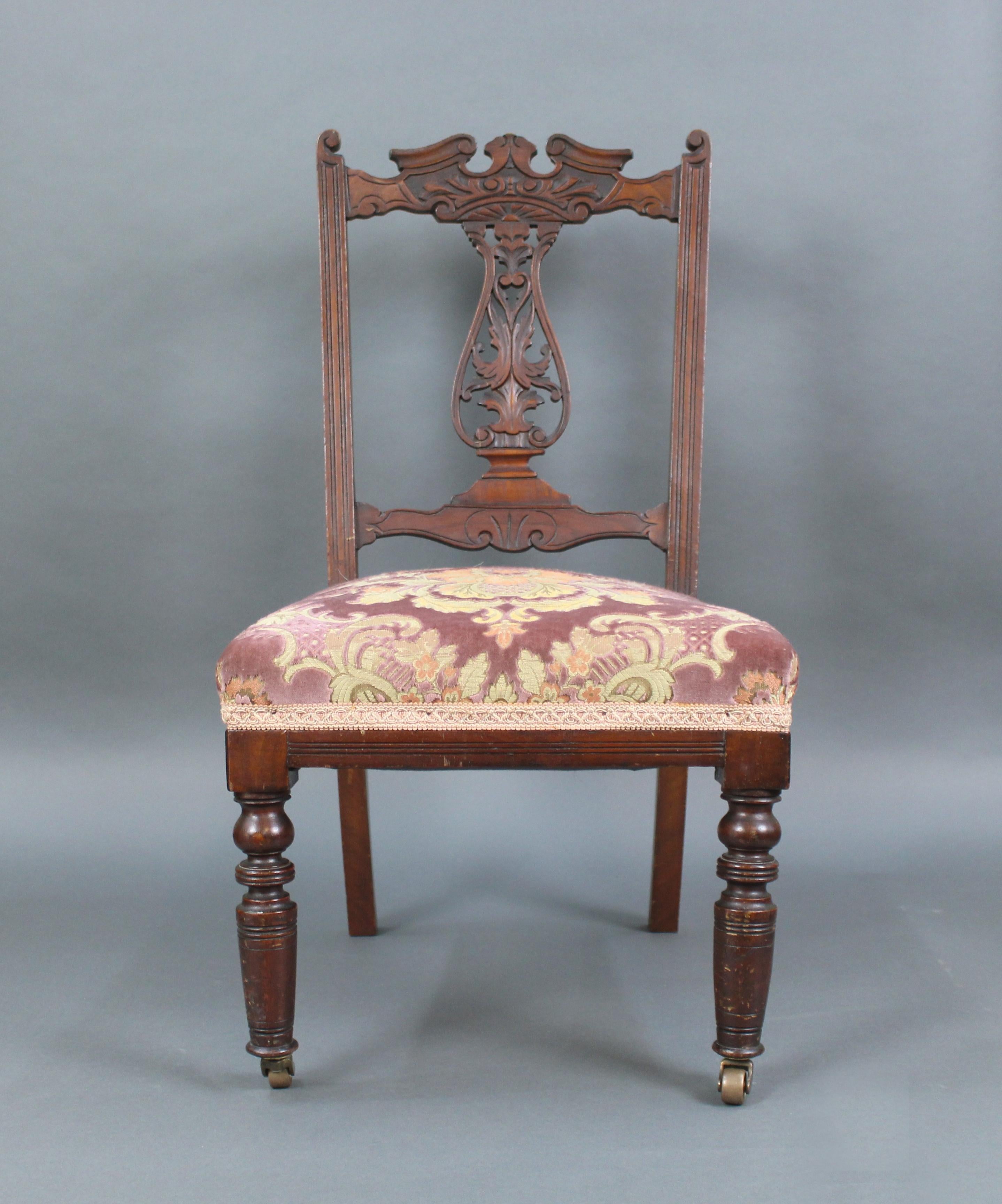 Measures: Width 46 cm 18 in
Height (to toprail) 84 cm 33 in
Height (to seat) 39 cm 15 1/2 in
 

 

Period: Edwardian
Wood: Mahogany
Fabric: Tapestry
Condition: Offered in good original condition. Some slight loosenessto joints and some