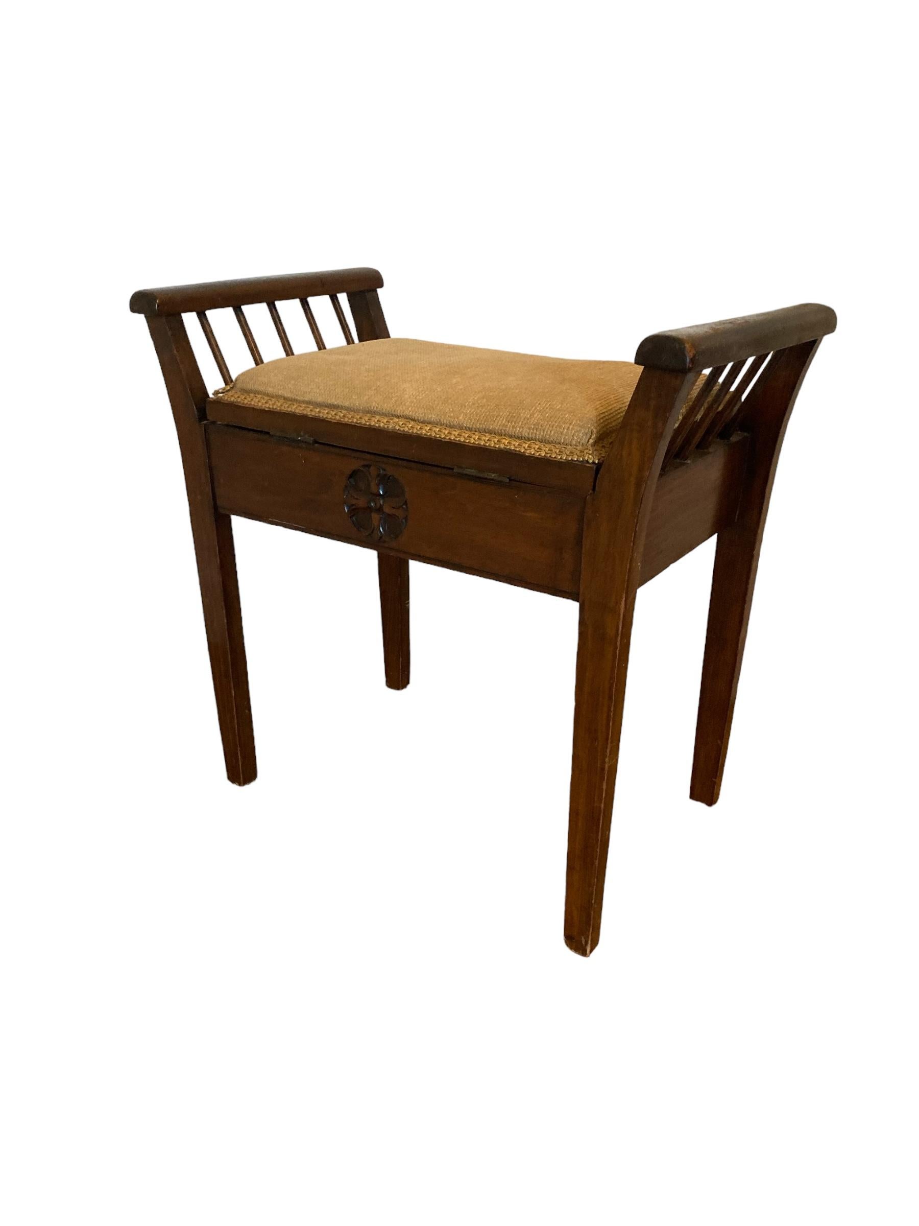 Edwardian Mahogany Piano Stool with Carving, probably used in a Church early 1900's. Beautifully made, solid seat with hinged top lid for storage. A classic piece for its' time.
H: 55cm, W: 57cm D: 33cm Seat H: 47cm