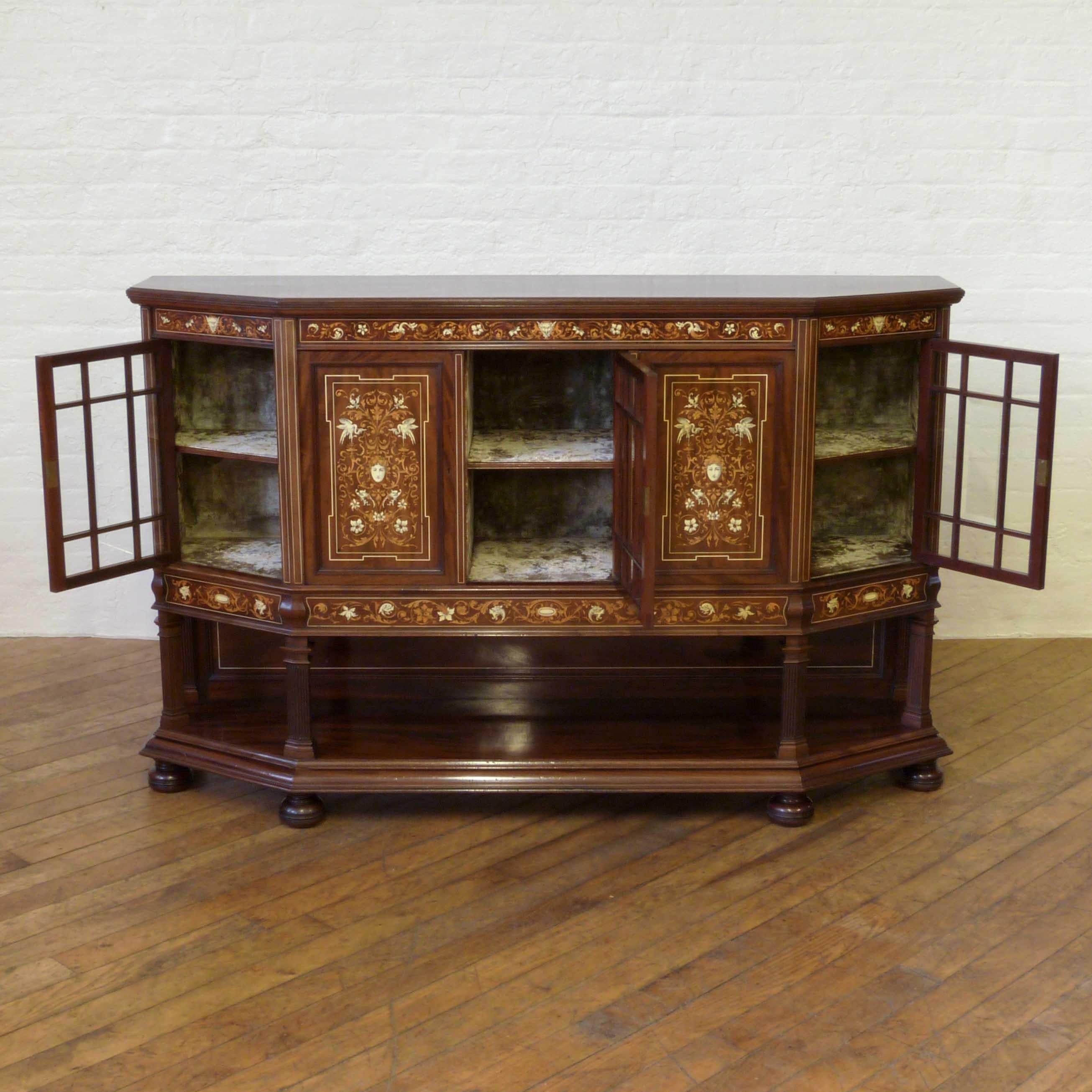 This is an exquisite mahogany side cabinet from the Edwardian period. The quality of the inlays is exceptional by any standards (the best we've seen in a very long time), with mythological beasts and birds intertwined with foliate decoration