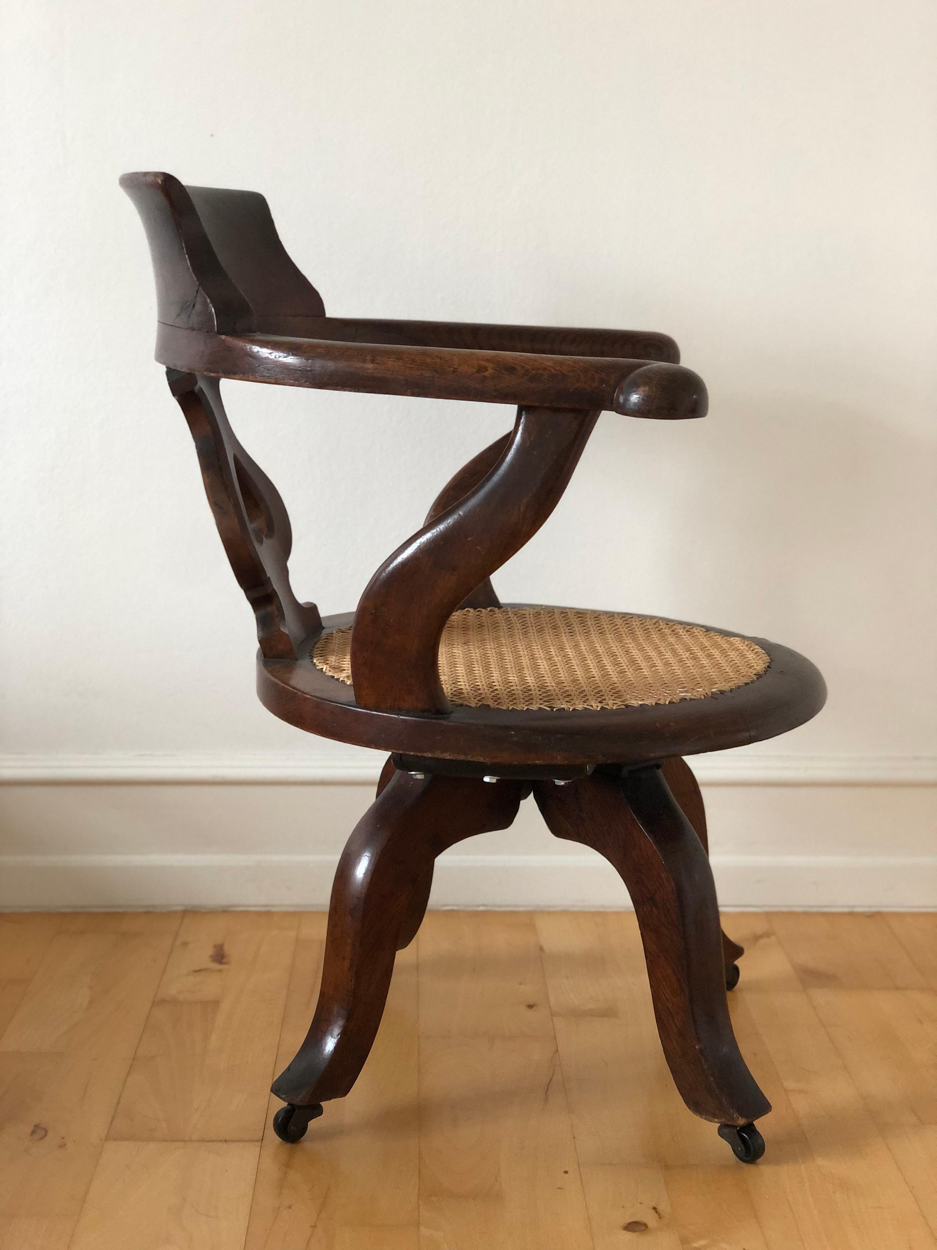 Cane Edwardian Mahogany Swivel Desk Chair on Castors Early 20th Century United Kingdo