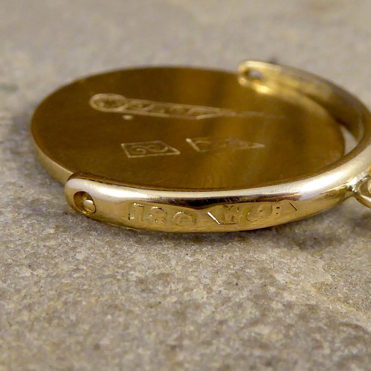 Edwardian Masonic Spinner 18 Carat Gold Pendant on 9 Carat Yellow Gold Chain In Good Condition In Yorkshire, West Yorkshire