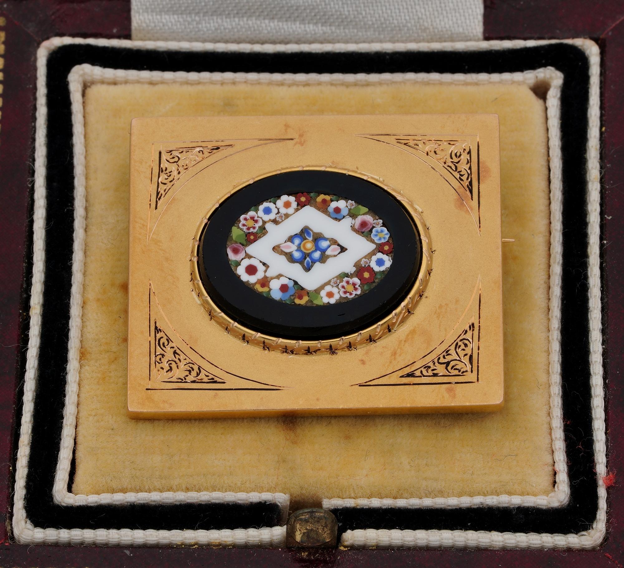 Micro Mosaic Past Art

This very fine example of Italian Micro mosaic brooch is from the Edwardian period 1910 ca 
Beautifully made with a large solid 18 KT gold rectangular frame with engraved details
Centring an oval Black Onyx gemstone with an