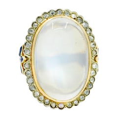 Edwardian Moonstone Diamond Sapphire 14 Karat Two-Tone Gold Cabochon Cluster Rin