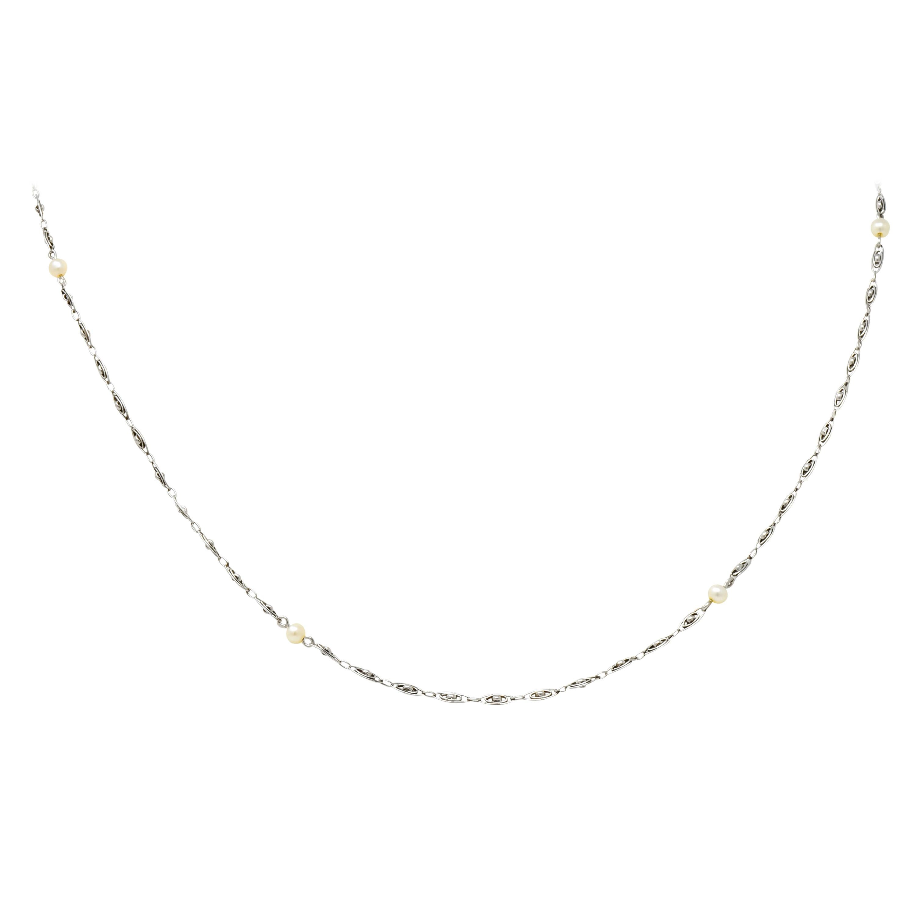 Edwardian Natural Freshwater Pearl Platinum Station Necklace, circa 1915