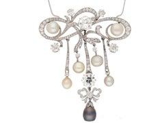 Edwardian natural pearl and diamond pendant/brooch, circa 1905.