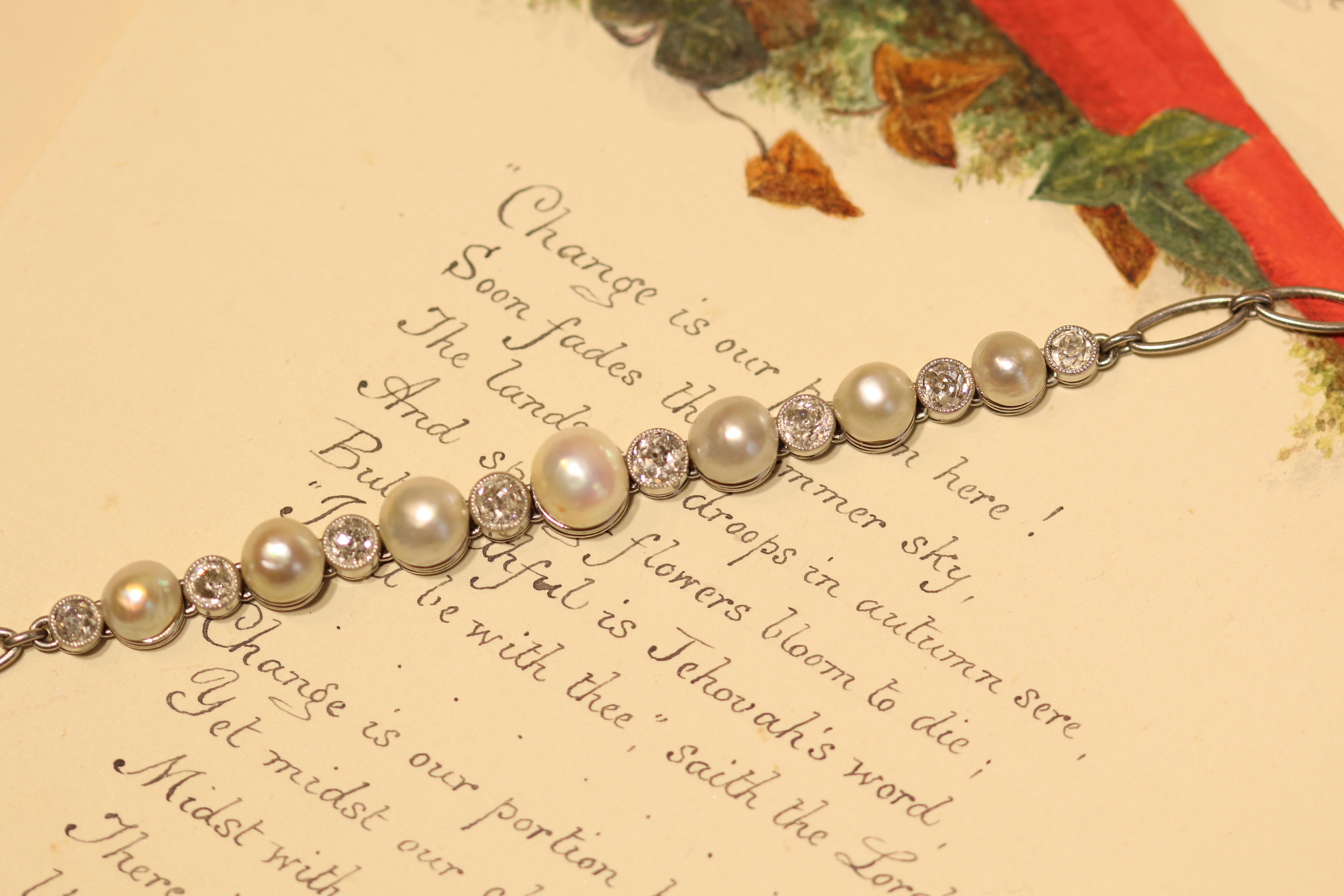 This is such a lovely pearl and diamond bracelet. It has seven natural pearls alternating with eight diamonds. The pearls are well matched but have a variation in colour that keeps the interest. On the underside of your wrist is an elegant platinum