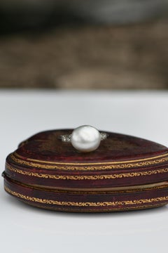 Edwardian Natural Pearl Diamond Platinum Engagement Ring, circa 1920