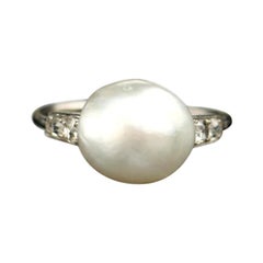 Edwardian Natural Pearl Diamond Platinum Engagement Ring, circa 1920