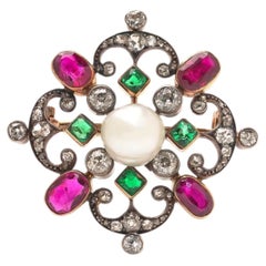 Edwardian Natural Pearl, Ruby, Emerald and Diamond Baroness Issaverdens Brooch