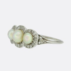 Edwardian Natural Pearl Three Stone and Diamond Ring