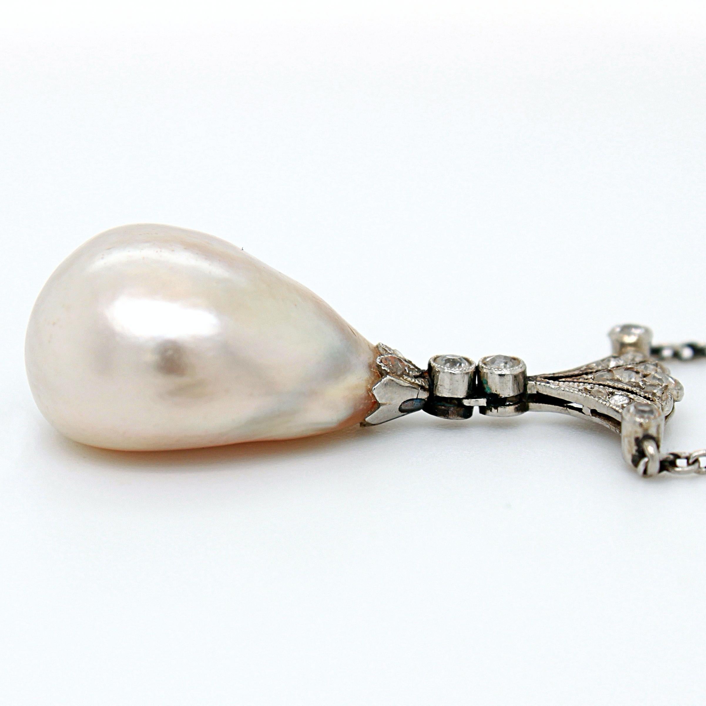 Pear Cut Edwardian Natural Saltwater Pearl and Diamond Pendant, circa 1910s For Sale