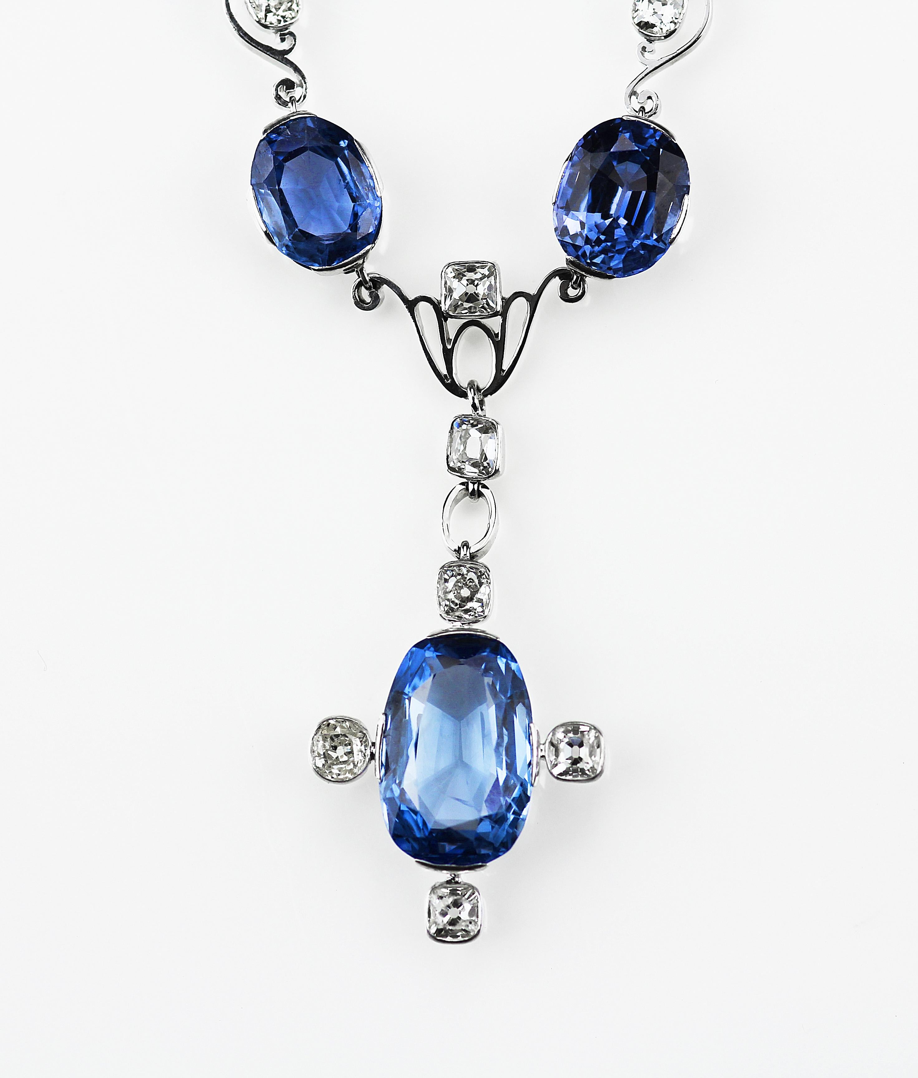 Antique Edwardian, circa 1900, sapphire and diamond necklace consisting of a drop pendant set in platinum. The necklace is flexible and gracefully draping down to your chest. Could also be worn as a head piece for special occasions. 
7 x Oval shape