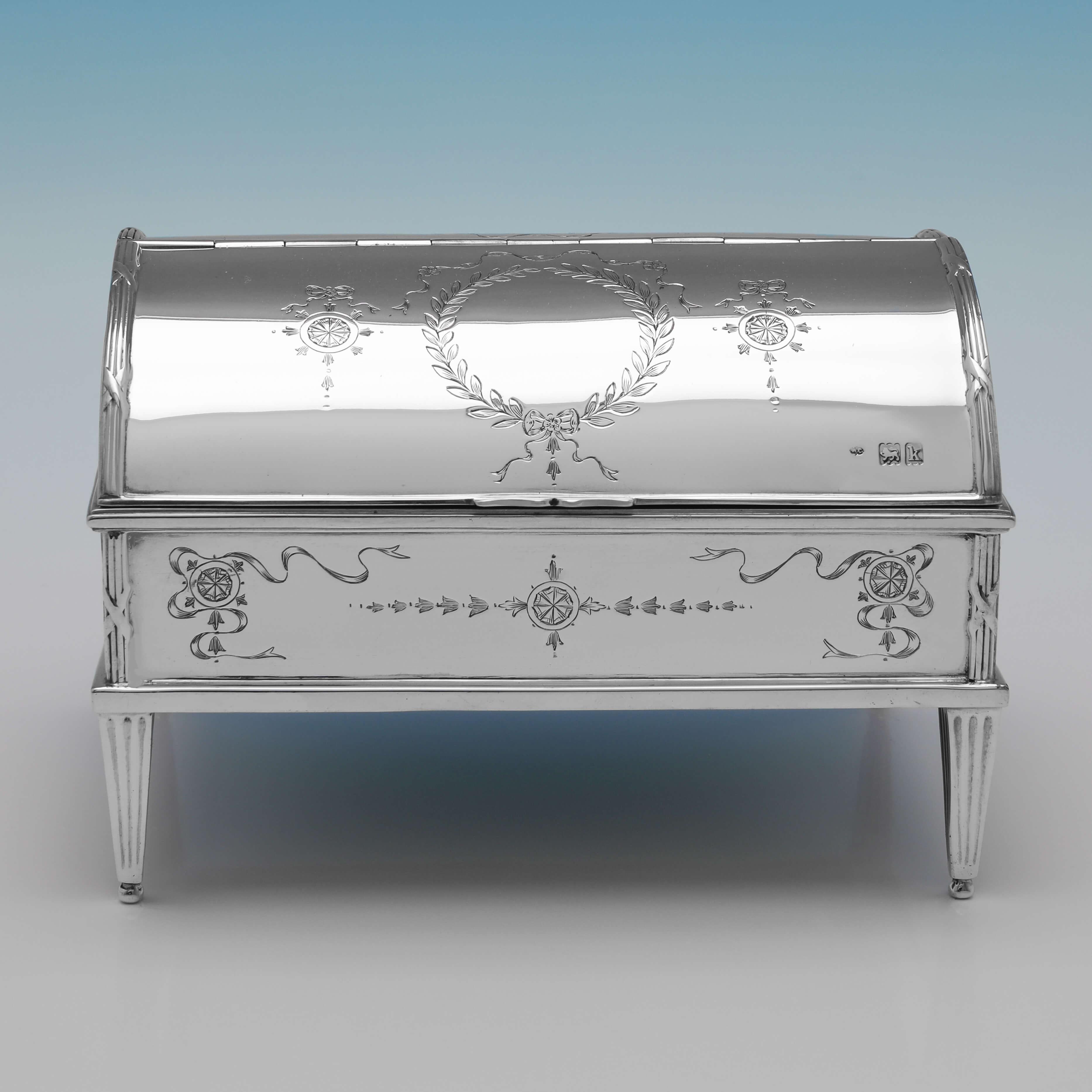 Hallmarked in London in 1905 by William Comyns, this very attractive, Edwardian, Antique Sterling Silver Jewellery Box, features Neoclassical style decoration throughout, and is lined in blue velvet. The jewellery box measures 4.25