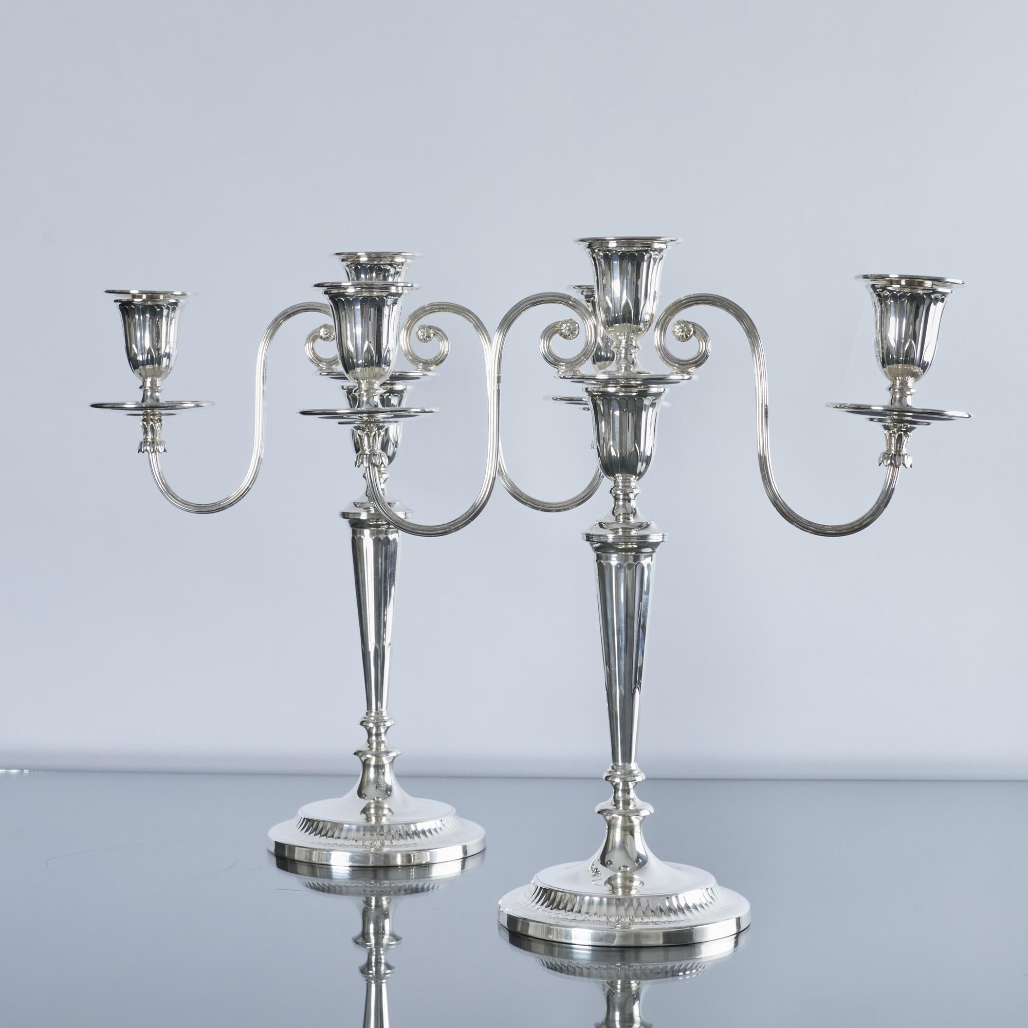 Neoclassical Pair of 2-branch 3-light neoclassical-style silver candelabra For Sale