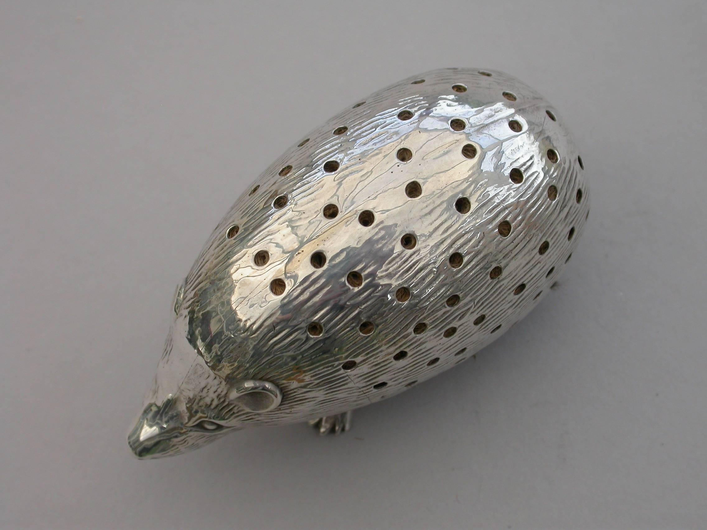 An Edwardian novelty silver pin cushion made in the form of a Hedgehog and of a large size.

By Levi & Salaman, Birmingham, 1904

In good condition with no damage or repair

Measure: Height 40 mm (1.57 inches)
Width 67 mm (2.64 inches)
Depth