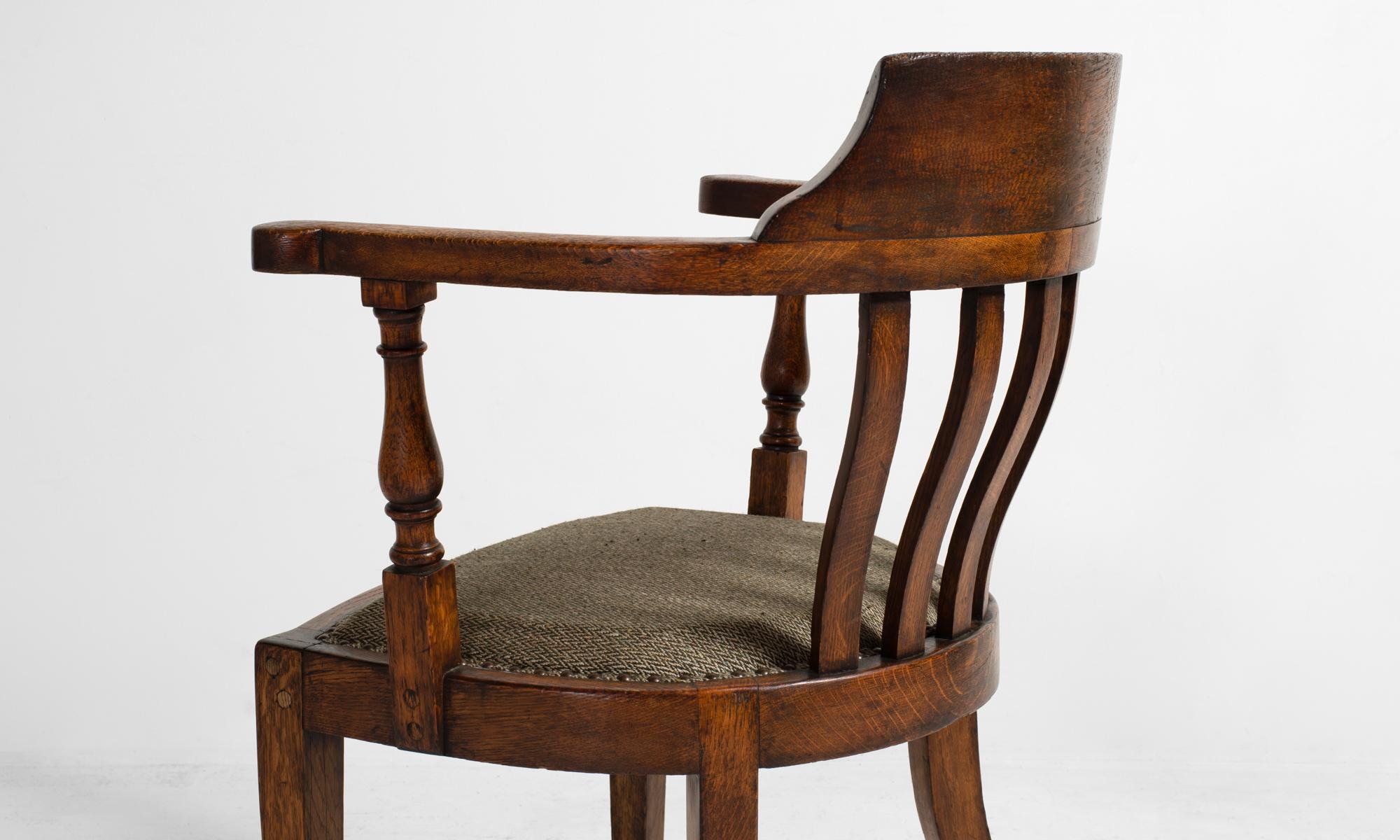 Early 20th Century Edwardian Oak Captains Chair, England, circa 1900