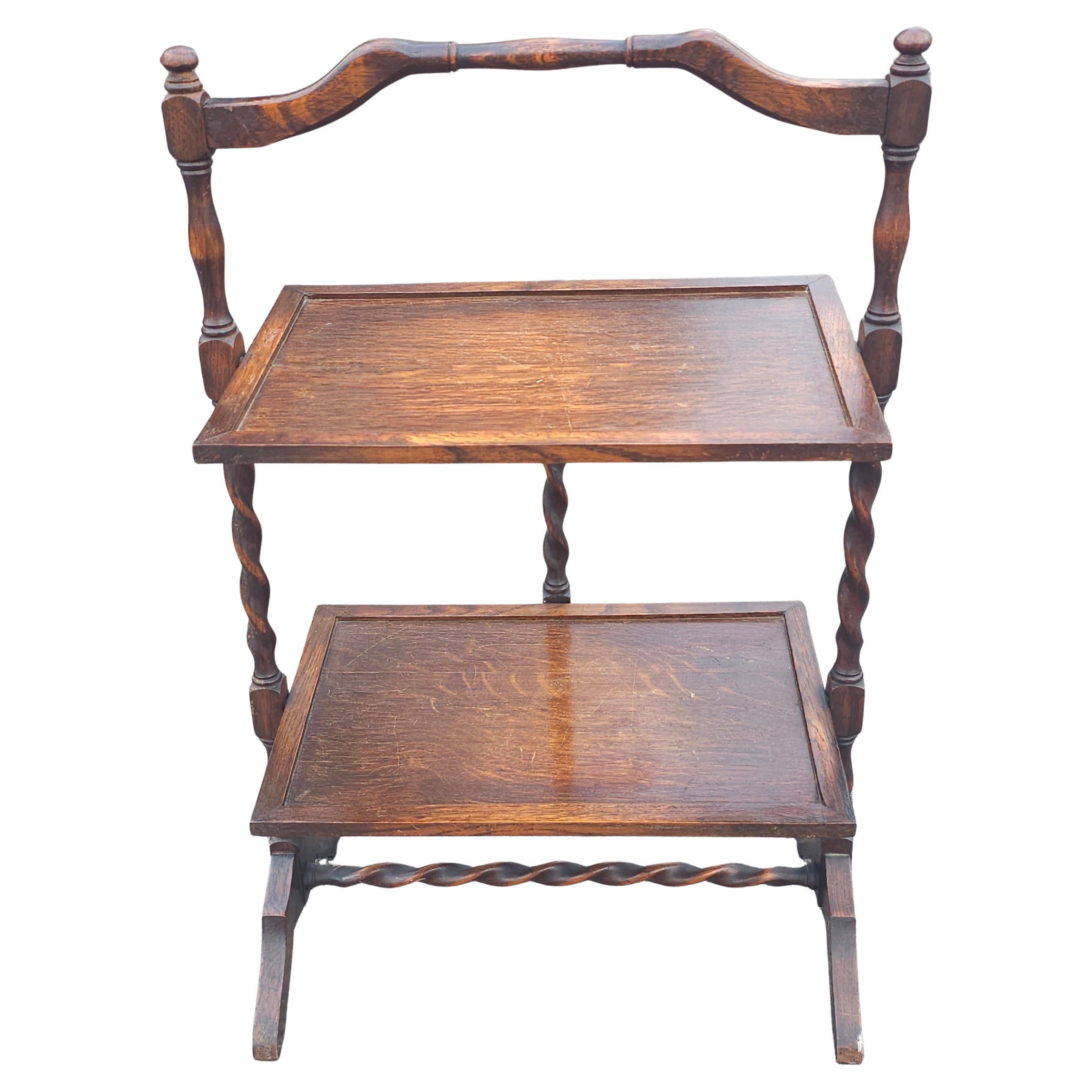 Edwardian Oak Tiered Barley Twist Free Standing Folding Etagere / Tea Table, Late 19th Century Early 20th Century.
Measures 20