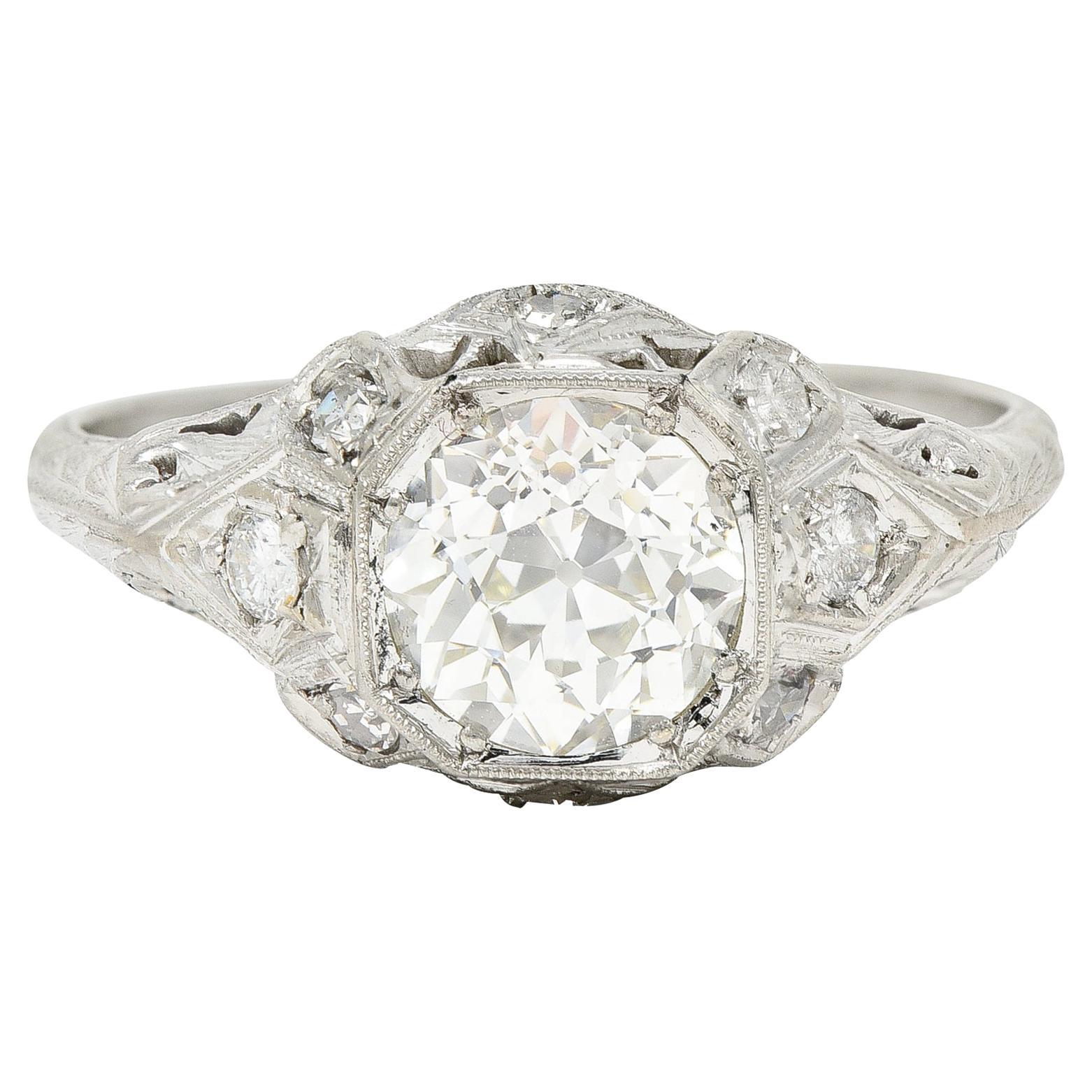 Edwardian Old European 1.64 Carats Diamond Platinum Foliate Engagement Ring For Sale