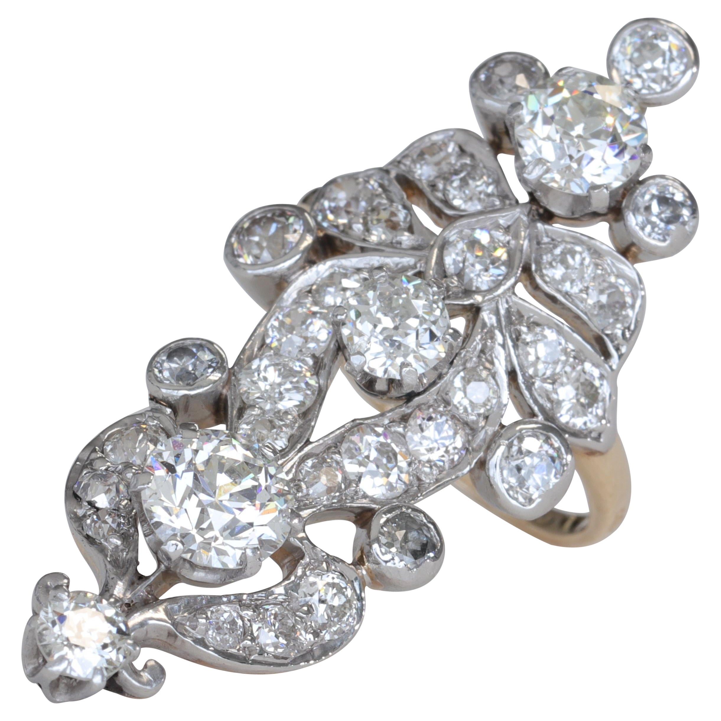 Anello da cocktail lungo in platino e oro giallo con diamante antico taglio europeo di epoca edoardiana