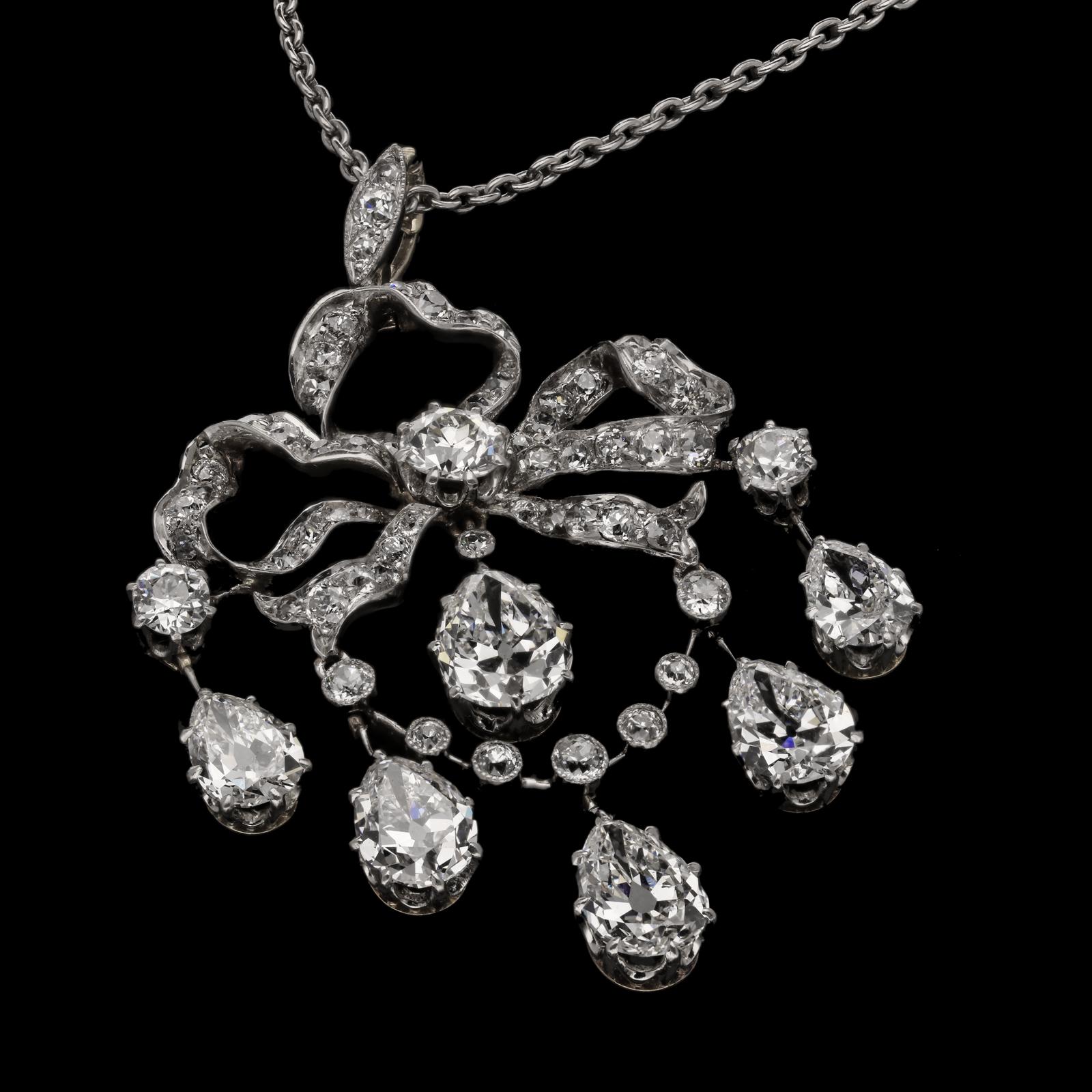 Women's or Men's Edwardian Old Mine Diamond Pear Shapes Pendant Ribbon Bow Design, circa 1910