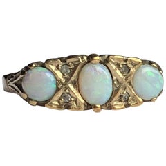 Edwardian Opal and Diamond 9 Carat Gold Three-Stone Ring