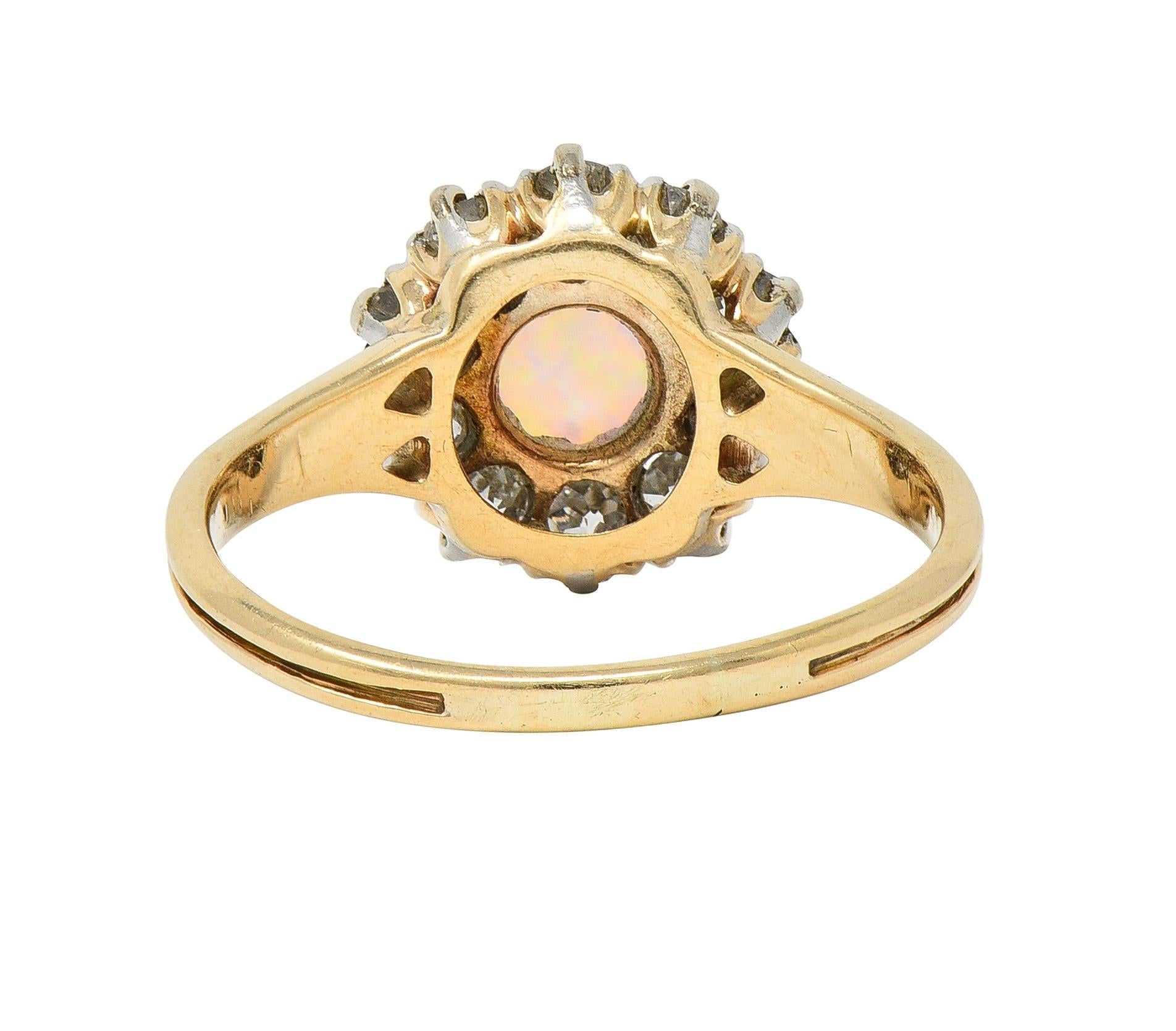 Edwardian Opal Diamond Platinum 14 Karat Yellow Gold Antique Halo Ring In Excellent Condition For Sale In Philadelphia, PA