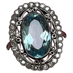 Antique Edwardian oval aquamarine and diamond ring.