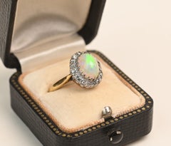 Edwardian Oval Cut Opal Ring. 0.30ct Diamond Cluster Engagement 14k Yellow Gold