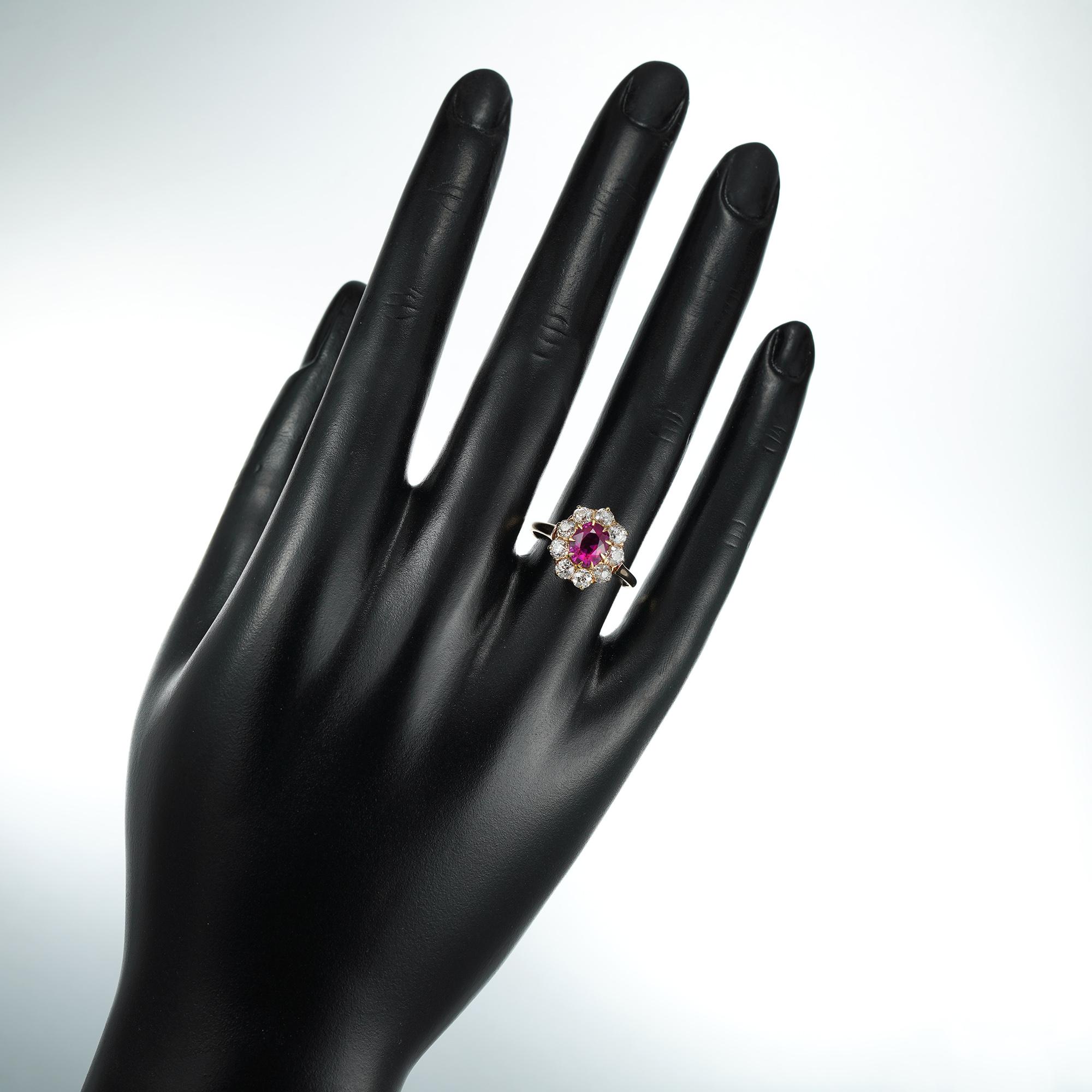 Edwardian Oval Ruby and Diamond Cluster Ring In Good Condition In London, GB