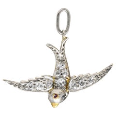 Antique Edwardian Pavè Diamond Platinum-Topped 18 Karat Yellow Gold Bird Swallow Charm