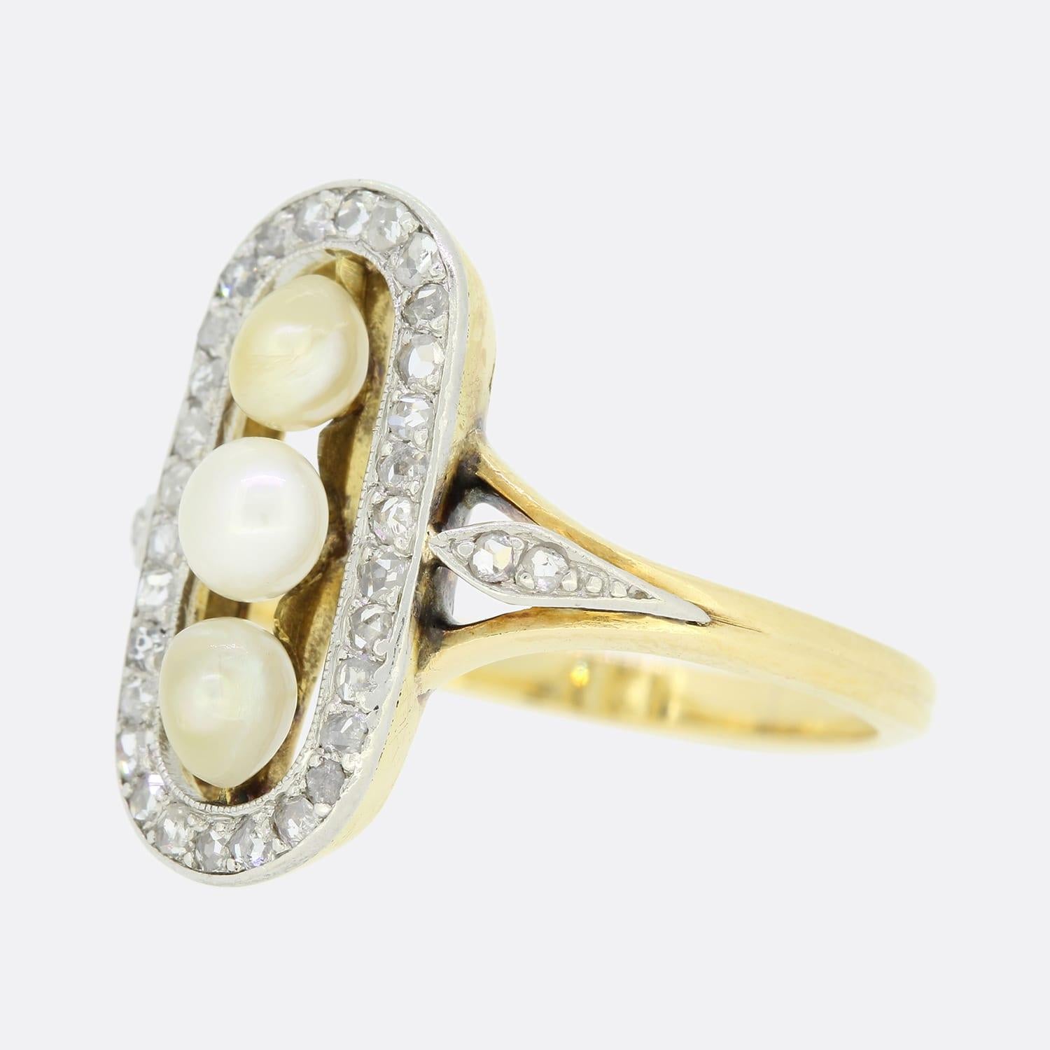 This is a lovely 18ct yellow gold Edwardian natural pearl and diamond ring. The centre of the ring is formed of 3 pearls which are drill set and surrounded by a border of sparkling rose cut diamonds. The tablet style is a typical Edwardian look