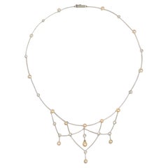 Edwardian Pearl, Diamond, and Platinum Festoon Necklace