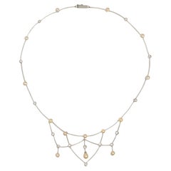 Edwardian Pearl, Diamond, and Platinum Festoon Necklace