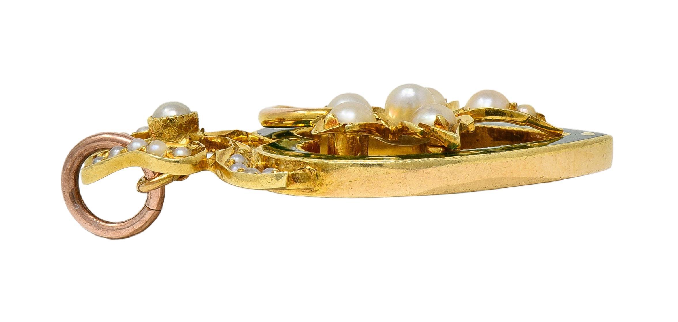 Women's Edwardian Pearl Enamel 14 Karat Yellow Gold Antique Bow Heart Pendant For Sale