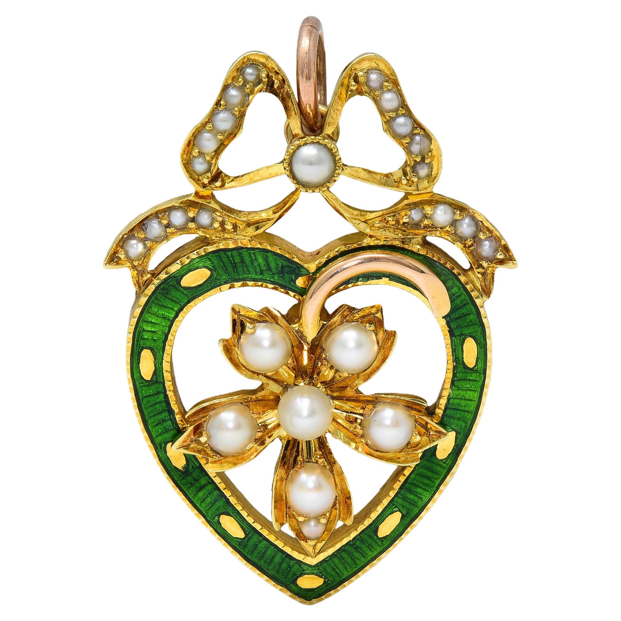 Edwardian Pearl Enamel 14 Karat Yellow Gold Antique Bow Heart Pendant For Sale