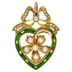 Edwardian Pearl Enamel 14 Karat Yellow Gold Antique Bow Heart Pendant