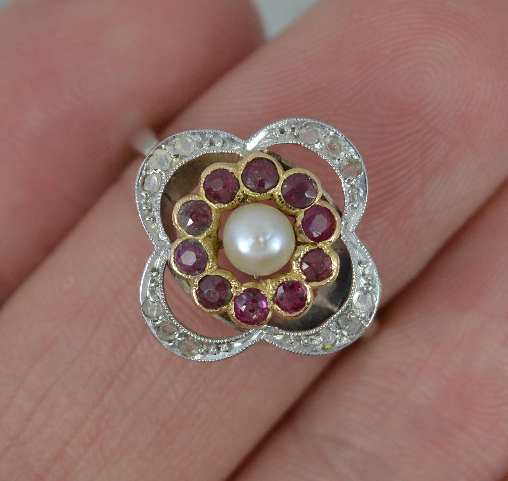 Edwardian Pearl Ruby and Diamond 18ct White Gold Quatrefoil Cluster Ring In Good Condition For Sale In St Helens, GB