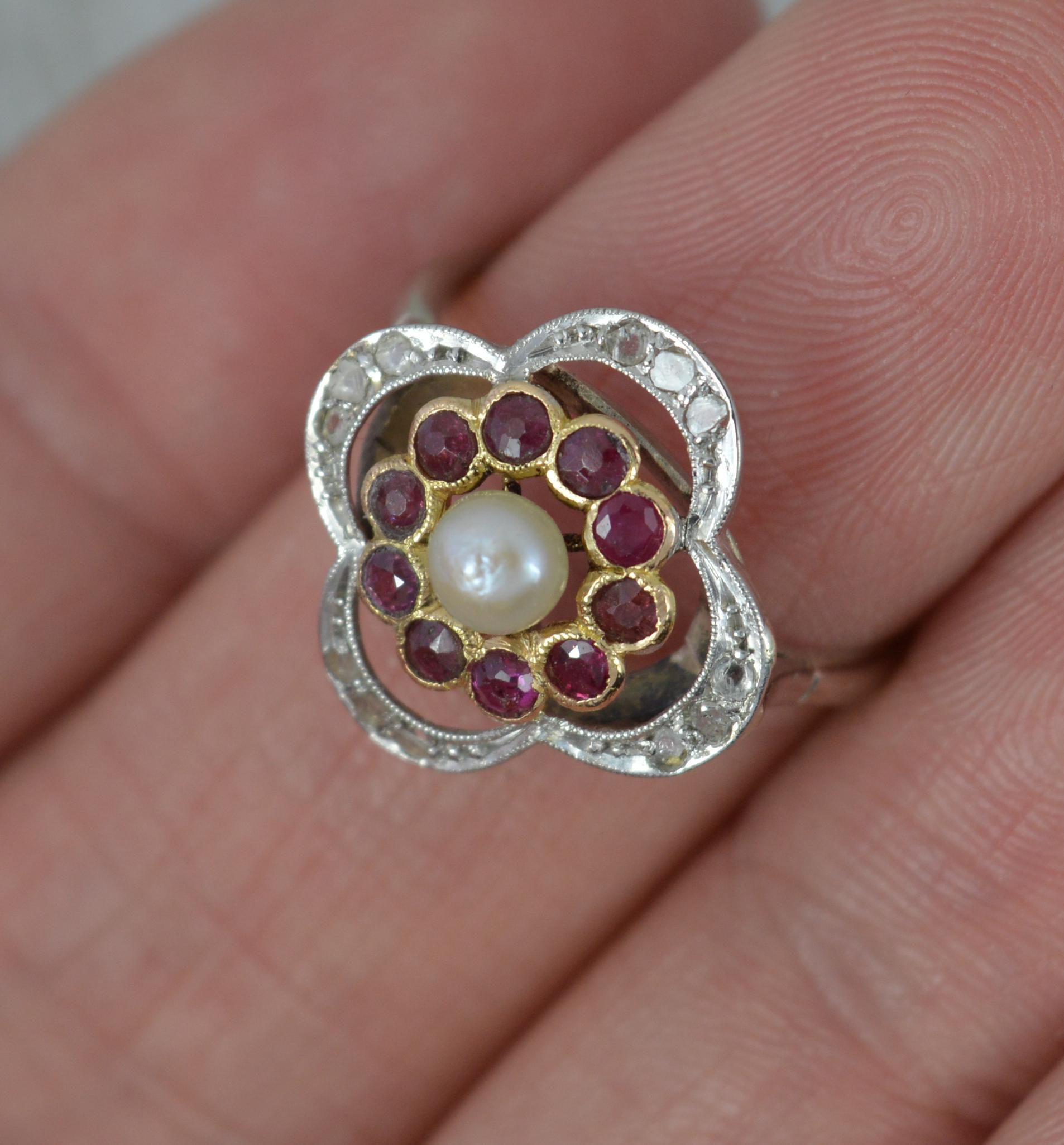 Women's Edwardian Pearl Ruby and Diamond 18ct White Gold Quatrefoil Cluster Ring For Sale