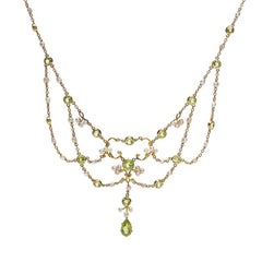 Edwardian Peridot Pearl and Gold Swag Necklace, circa 1900